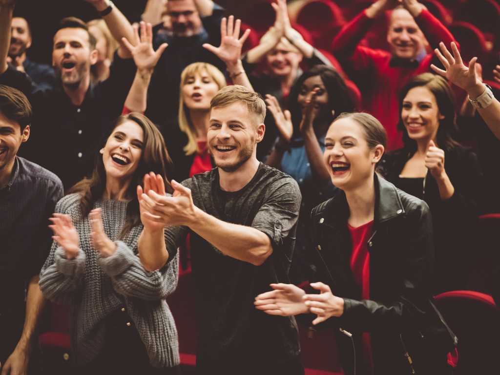 audience clapping for talent show performers