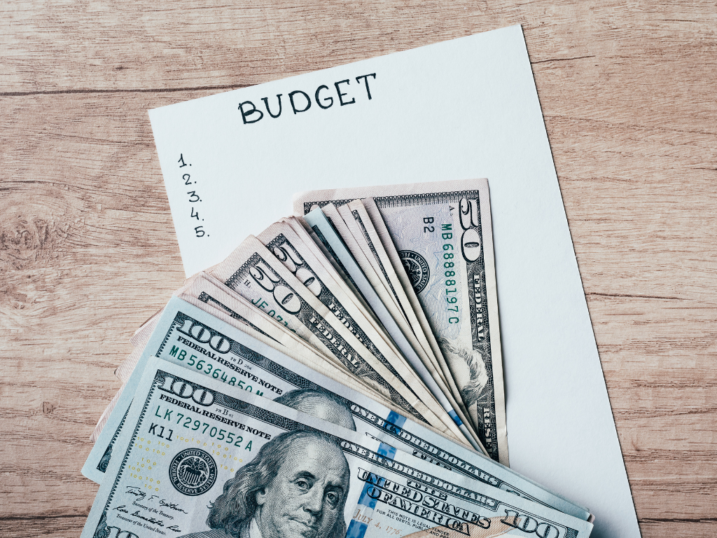 budget notes with cash