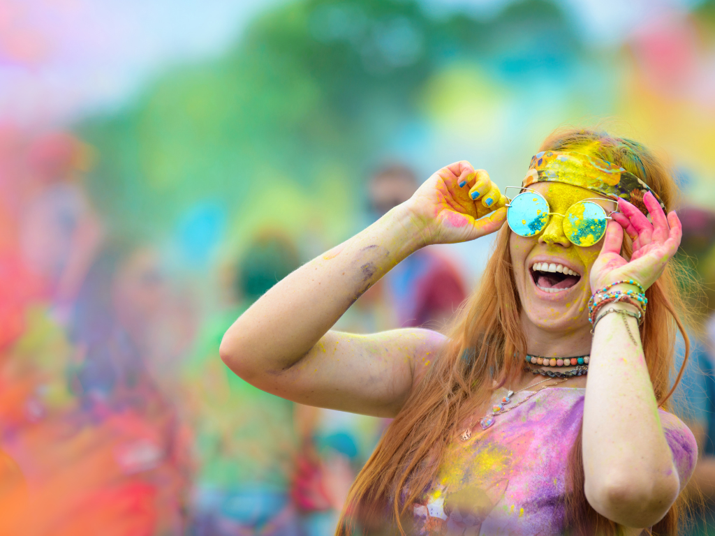 girl covered in color powder