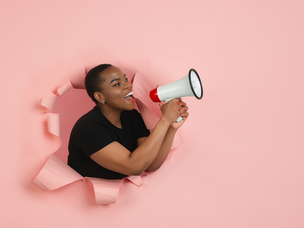girl with megaphone for awareness