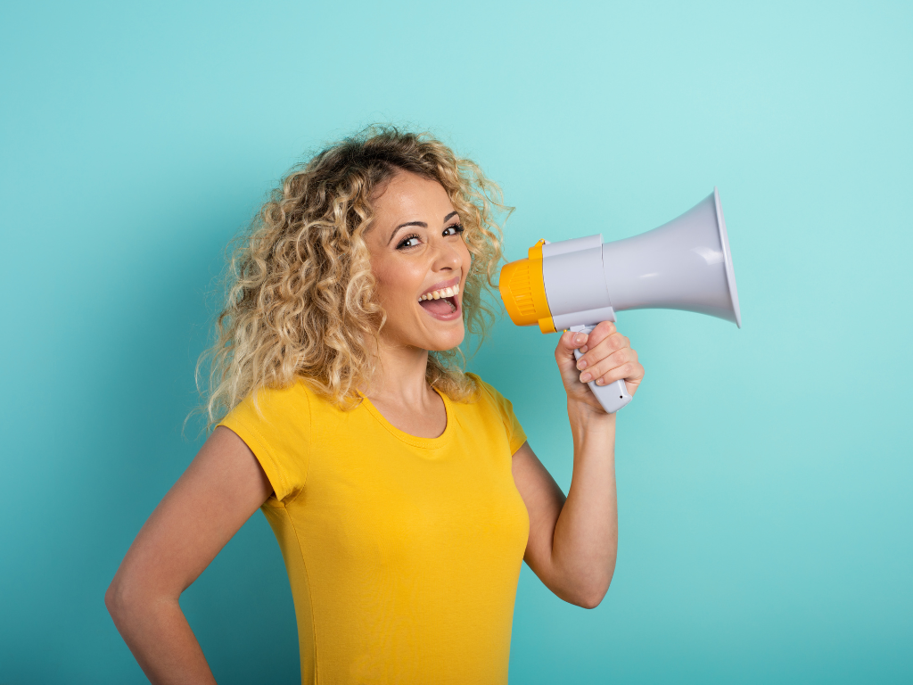 girl with megaphone promoting a fundraiser