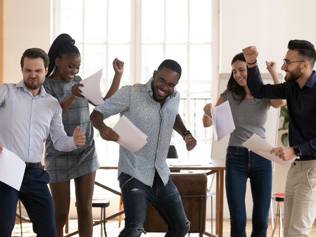 people celebrating a successful fundraiser