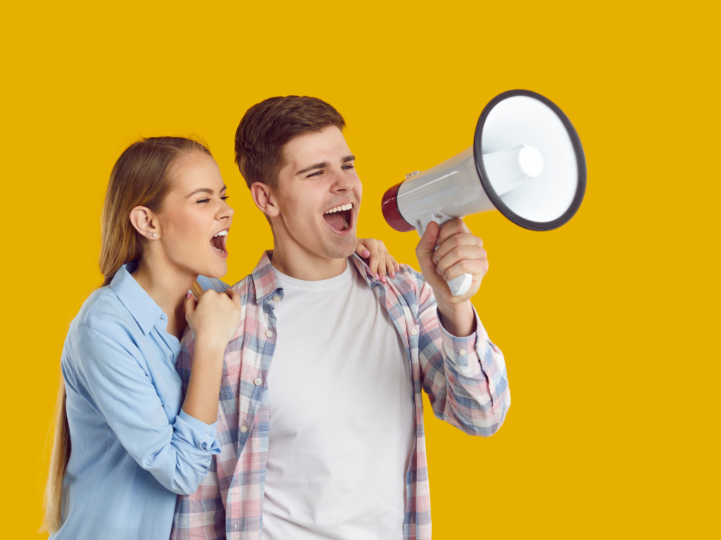 people promoting fundraiser with megaphone