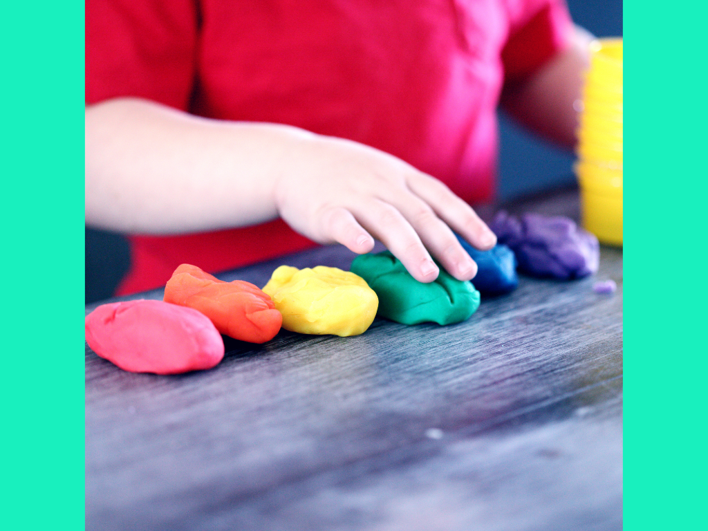 child playing with air dry clay