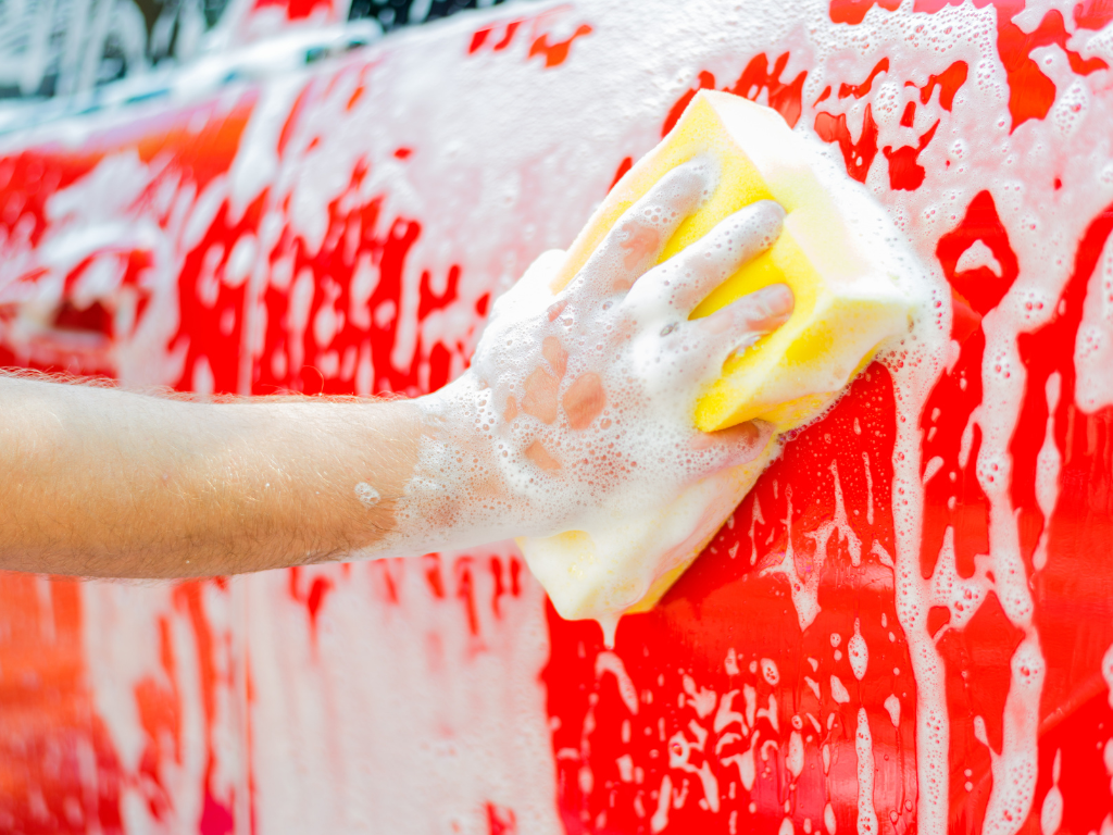 soapy sponge washing vehicle